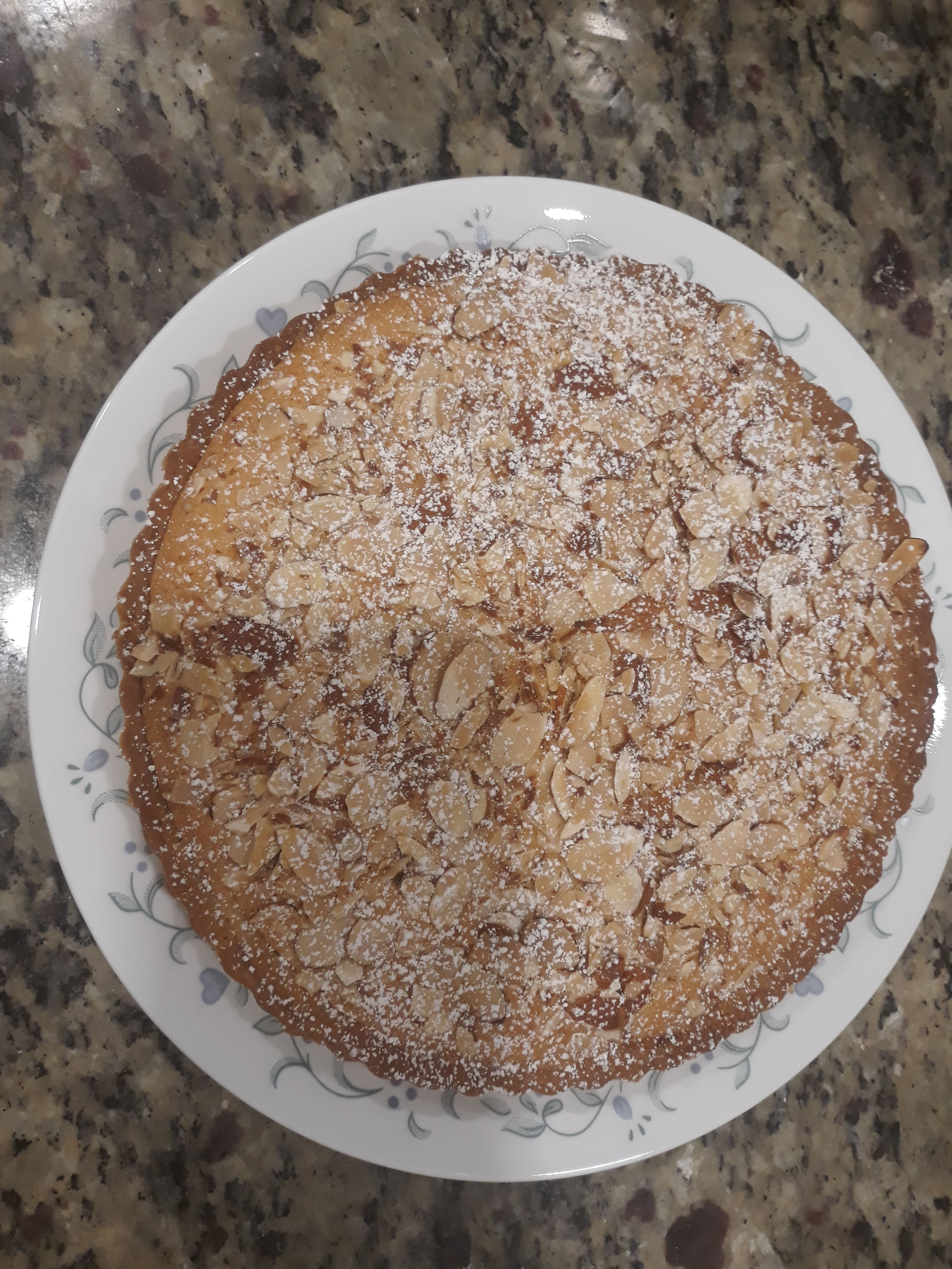 Almond cake dusted with powdered sugar